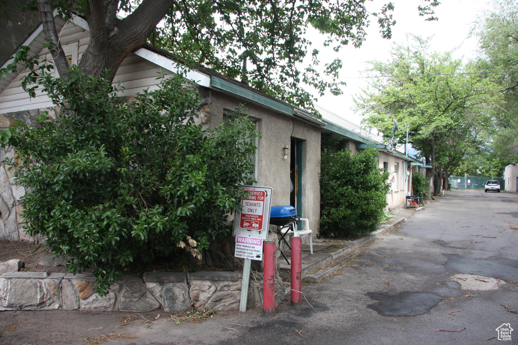 View of front of home featuring stucco siding
