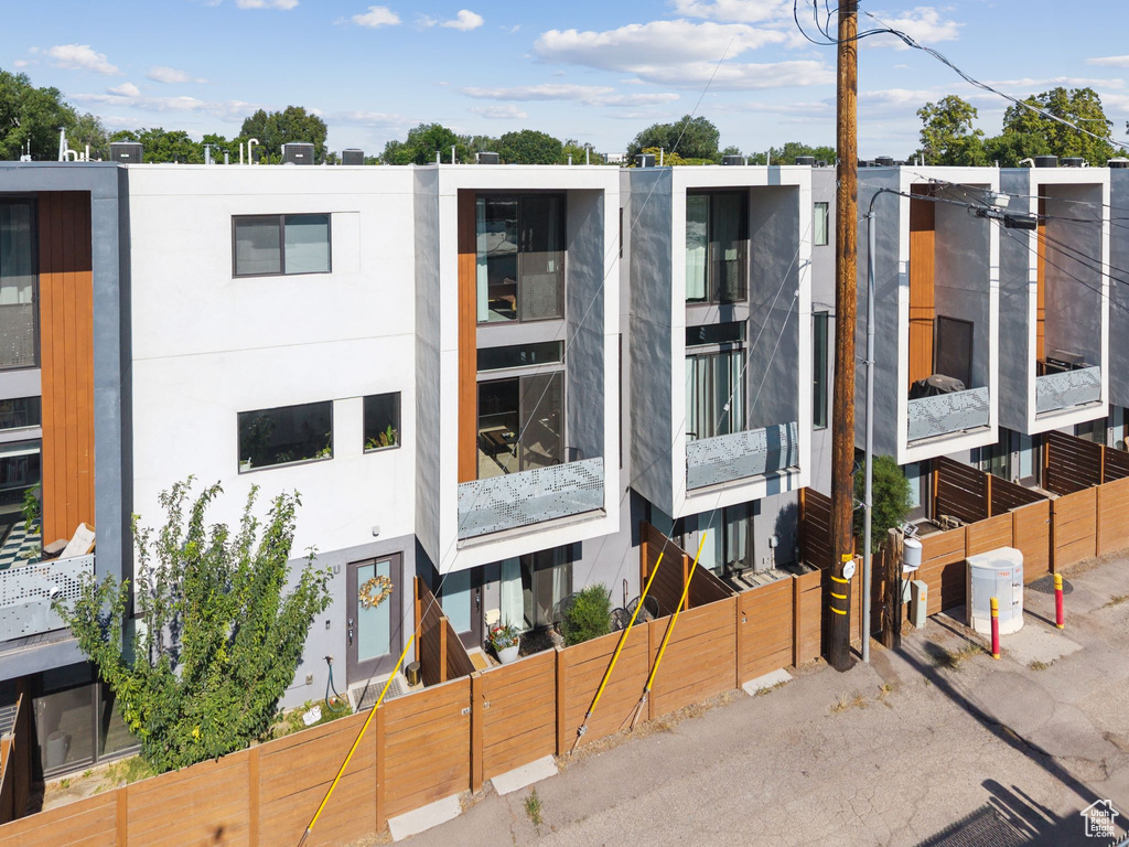 View of front facade featuring stucco siding