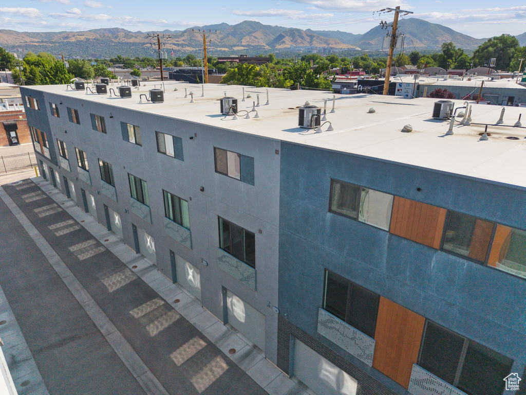 View of building exterior featuring a mountain view