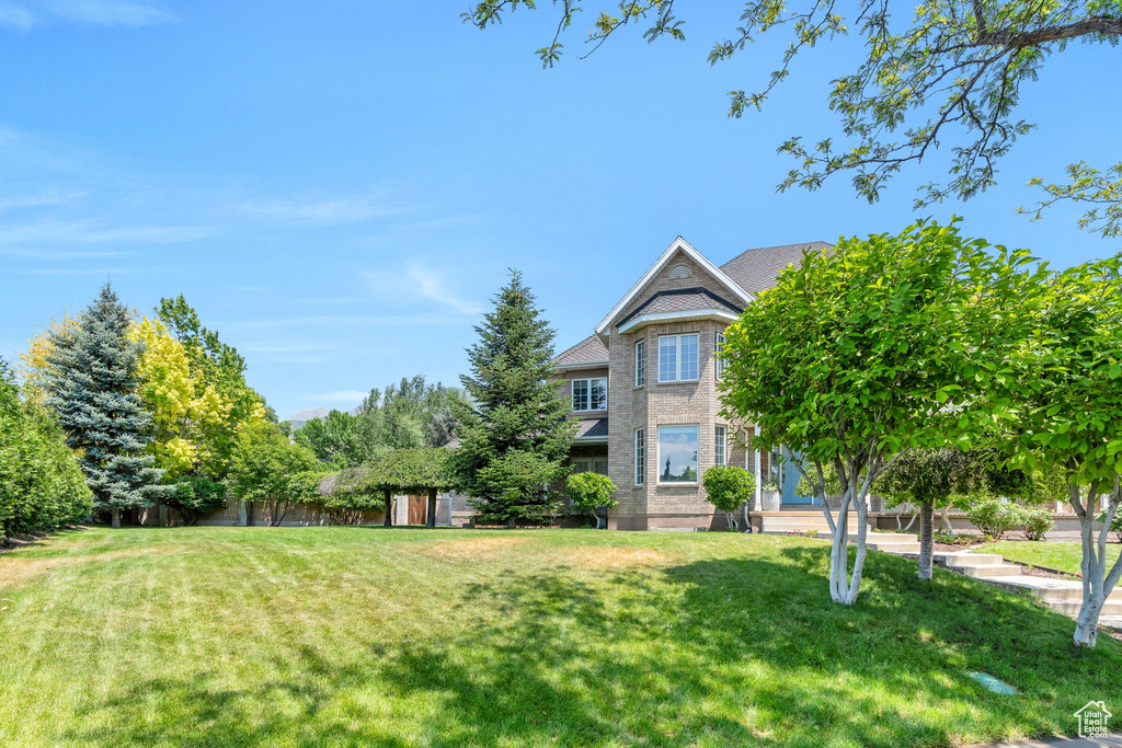 View of front of home with a front lawn