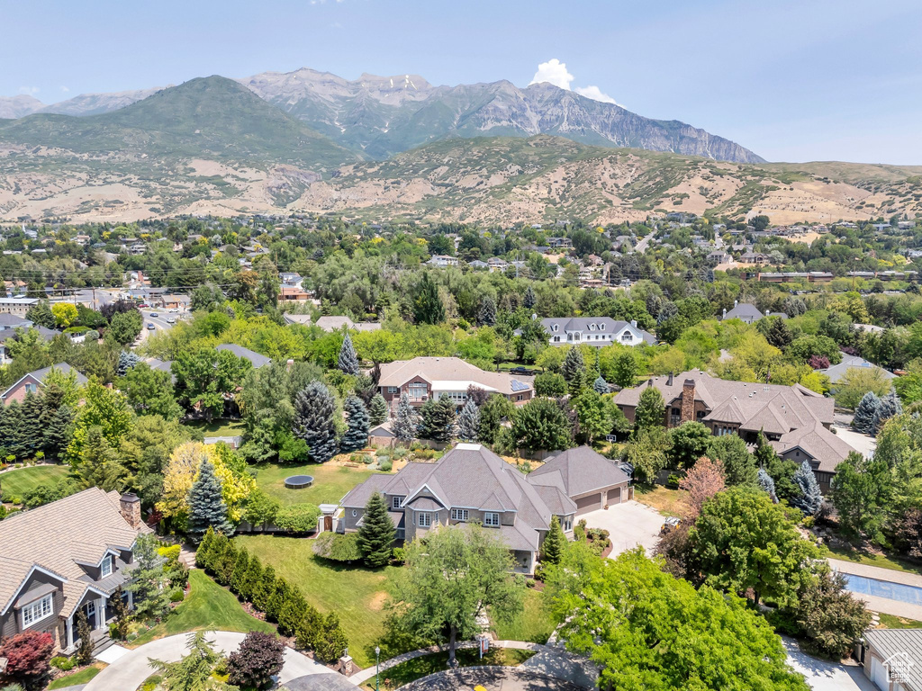 Aerial view of residential area with a mountainous background