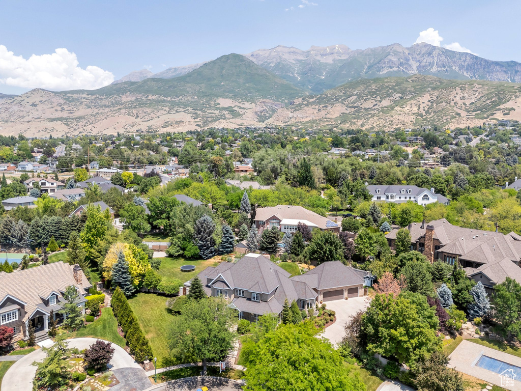 Aerial view of residential area with mountains