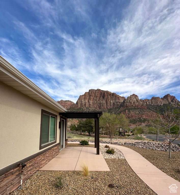View of patio featuring a mountain view