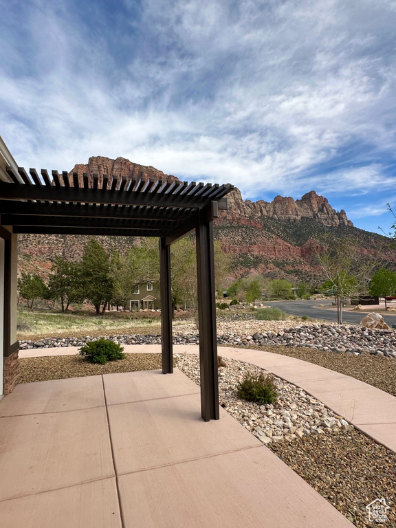 View of patio featuring a mountain view