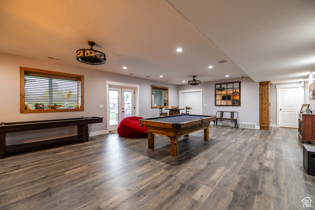 Playroom with dark wood-style flooring, pool table, french doors, and recessed lighting