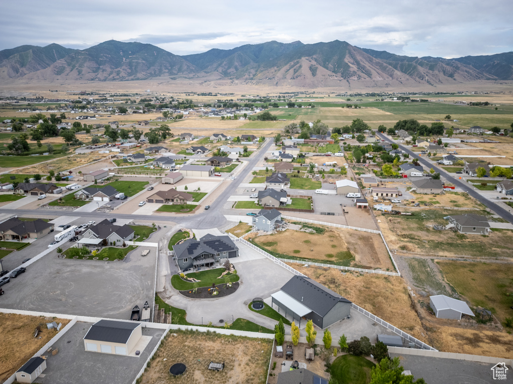 Aerial view of residential area with a mountainous background