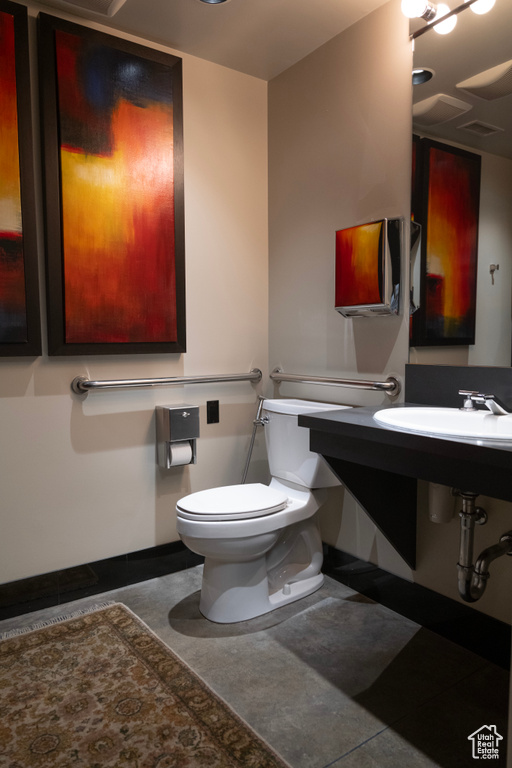 Bathroom with toilet and a sink