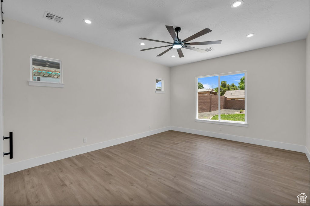 Spare room featuring recessed lighting, wood finished floors, and ceiling fan