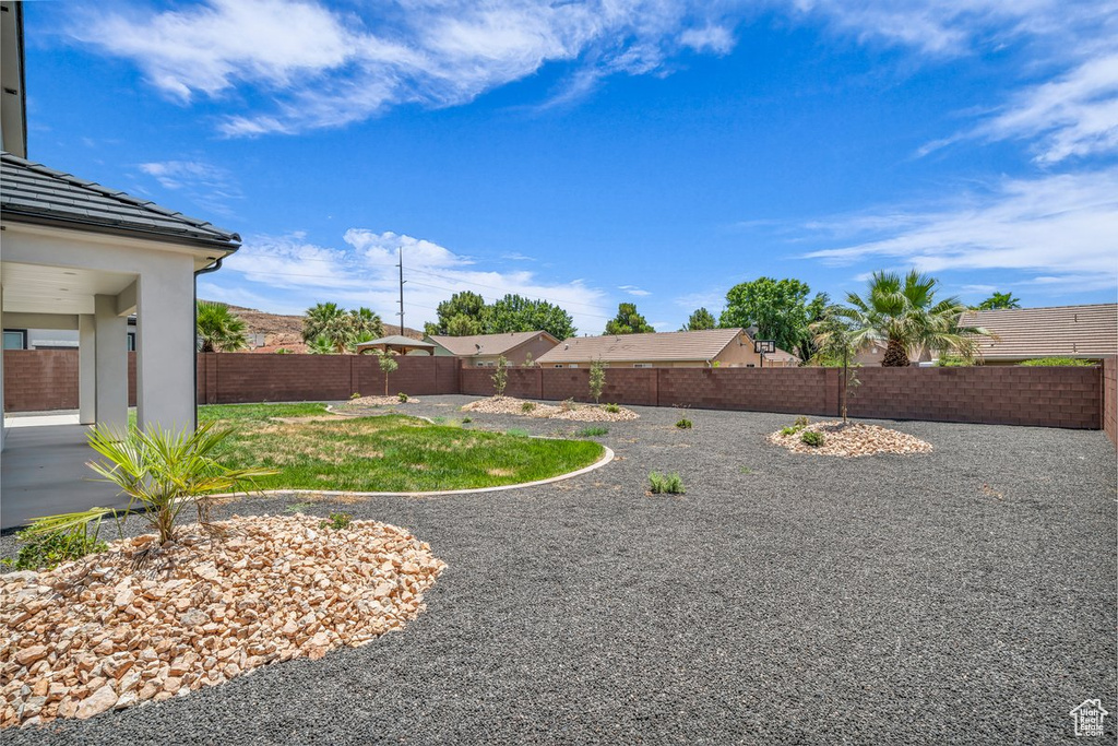 View of fenced backyard