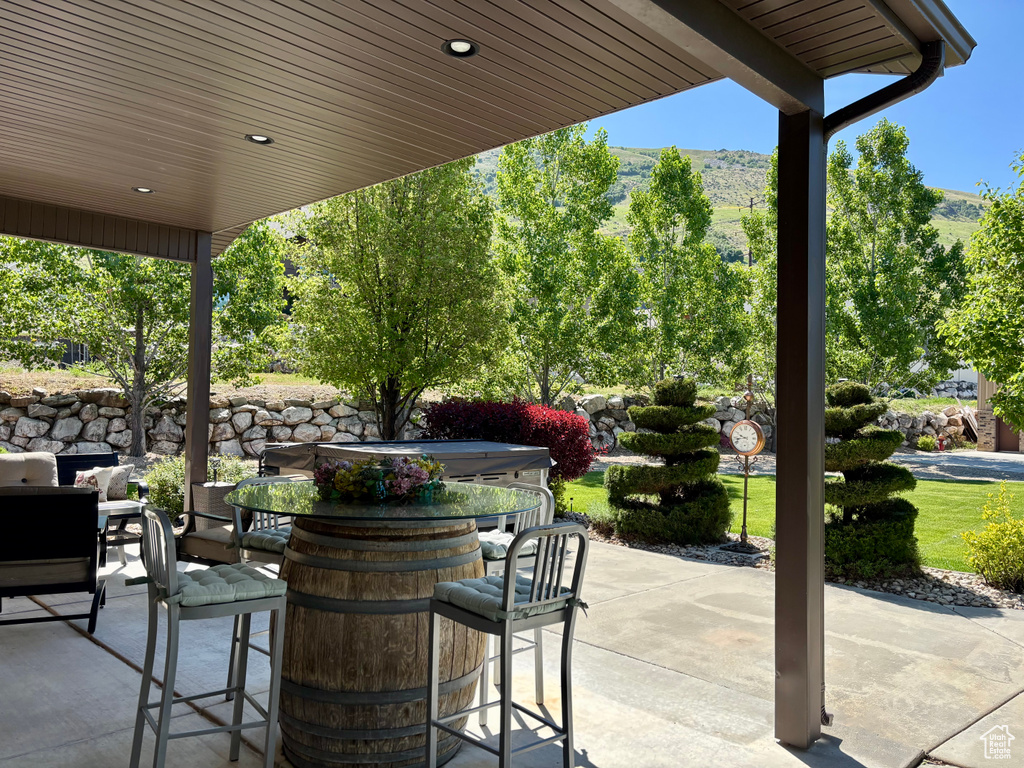 View of patio featuring a mountain view