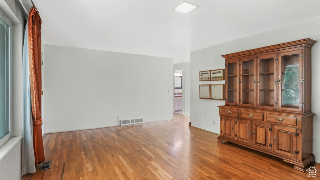 Unfurnished room featuring light wood finished floors