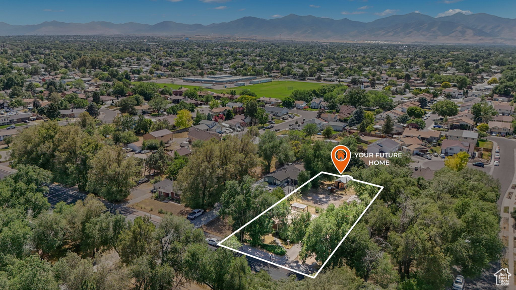 Aerial view of property's location with mountains and property boundaries highlighted