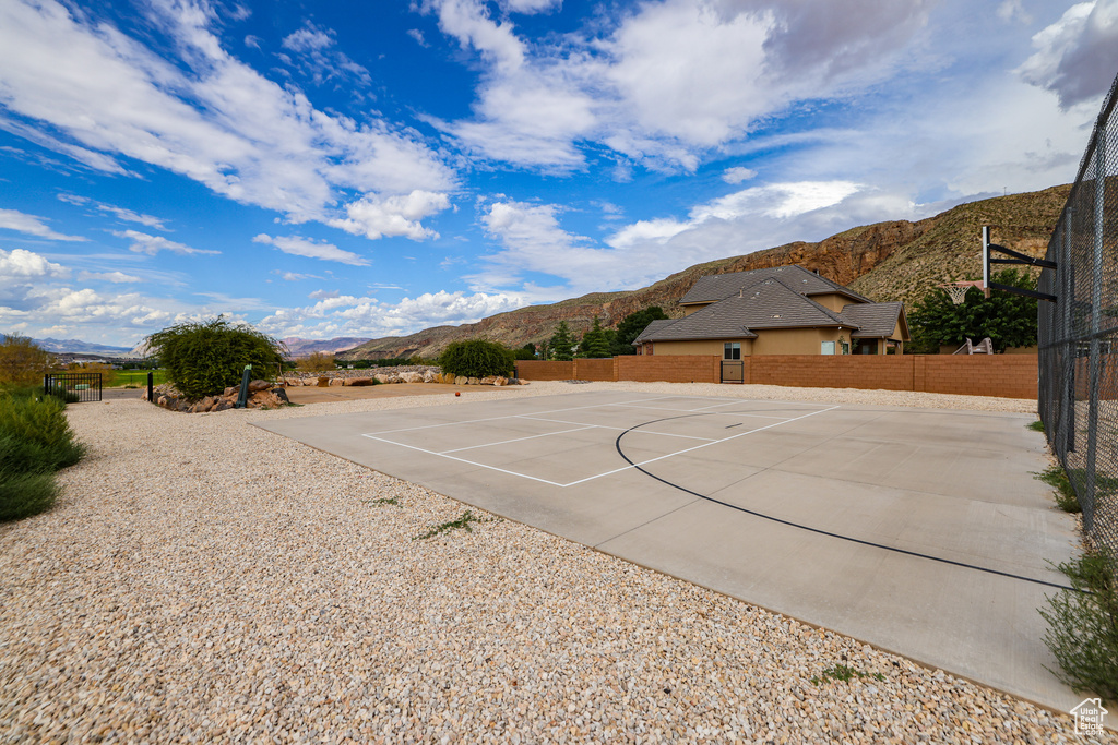 View of basketball court with a mountain view and community basketball court