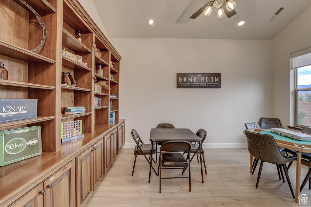 Dining room with a ceiling fan, a desk, light wood-type flooring, and recessed lighting