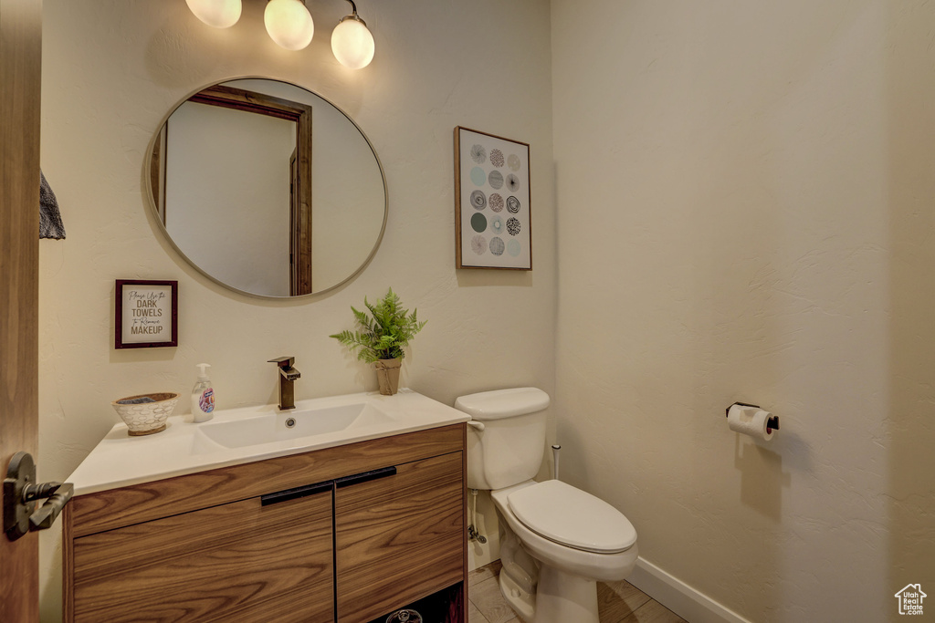Bathroom featuring toilet and vanity
