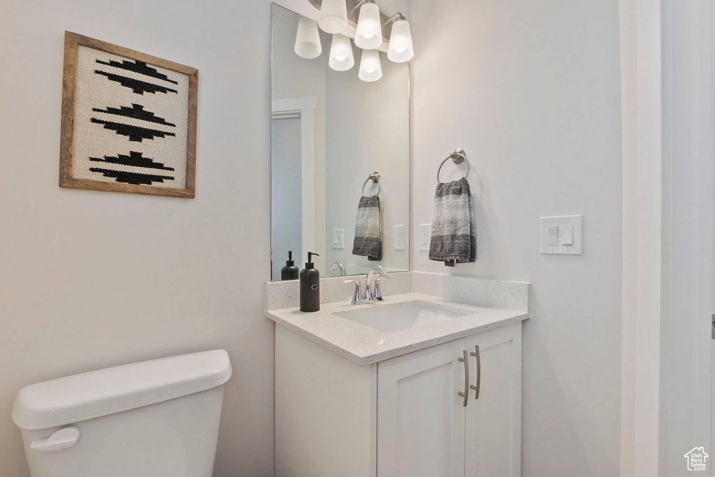 Half bath with toilet and vanity