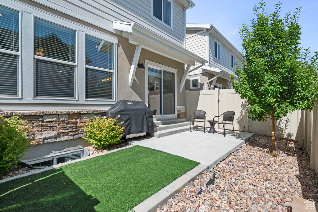 View of yard with a patio