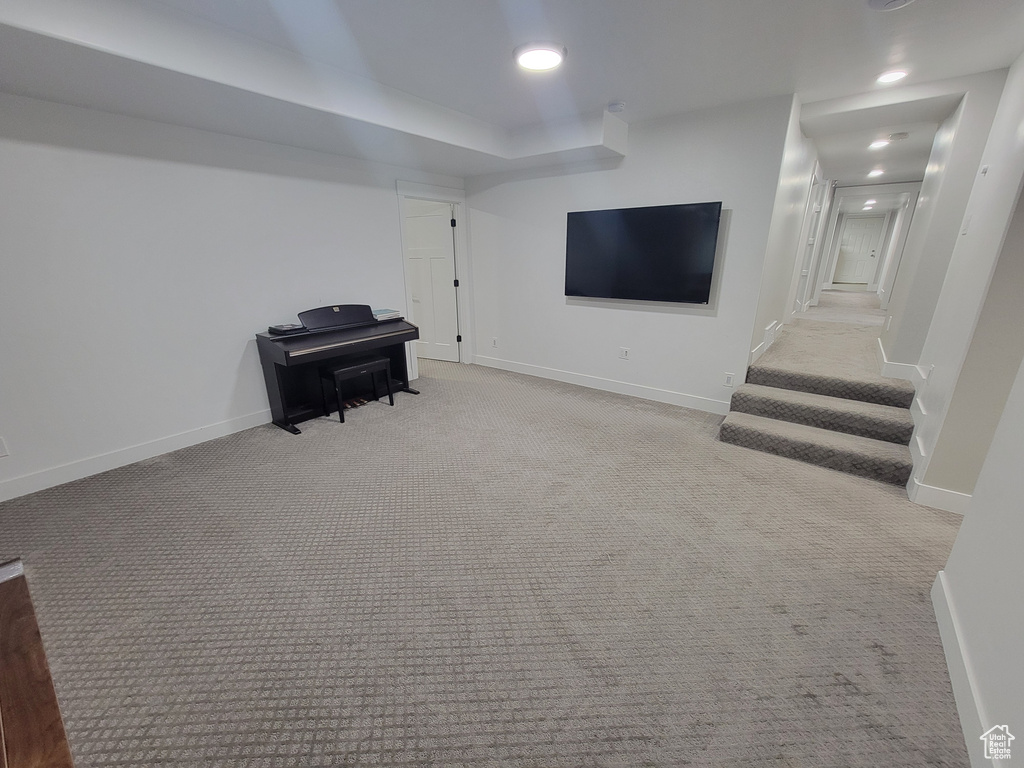 Finished below grade area with carpet and recessed lighting