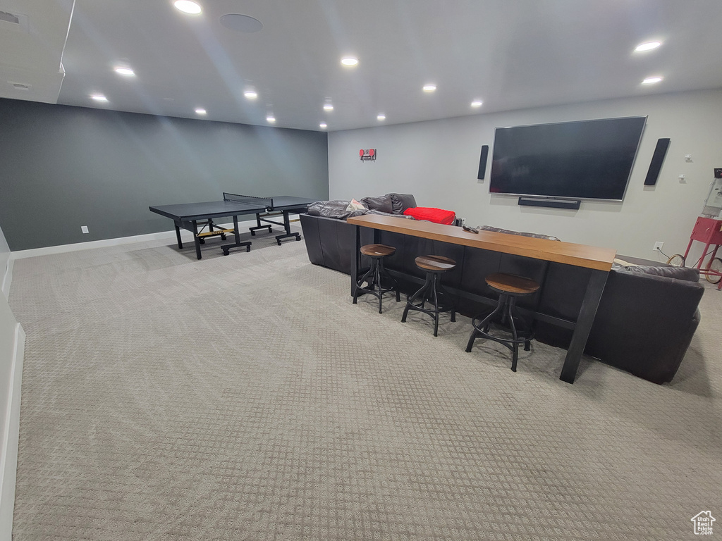 Game room with carpet flooring and recessed lighting