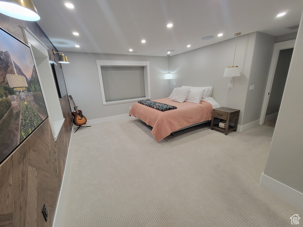Bedroom featuring light colored carpet and recessed lighting