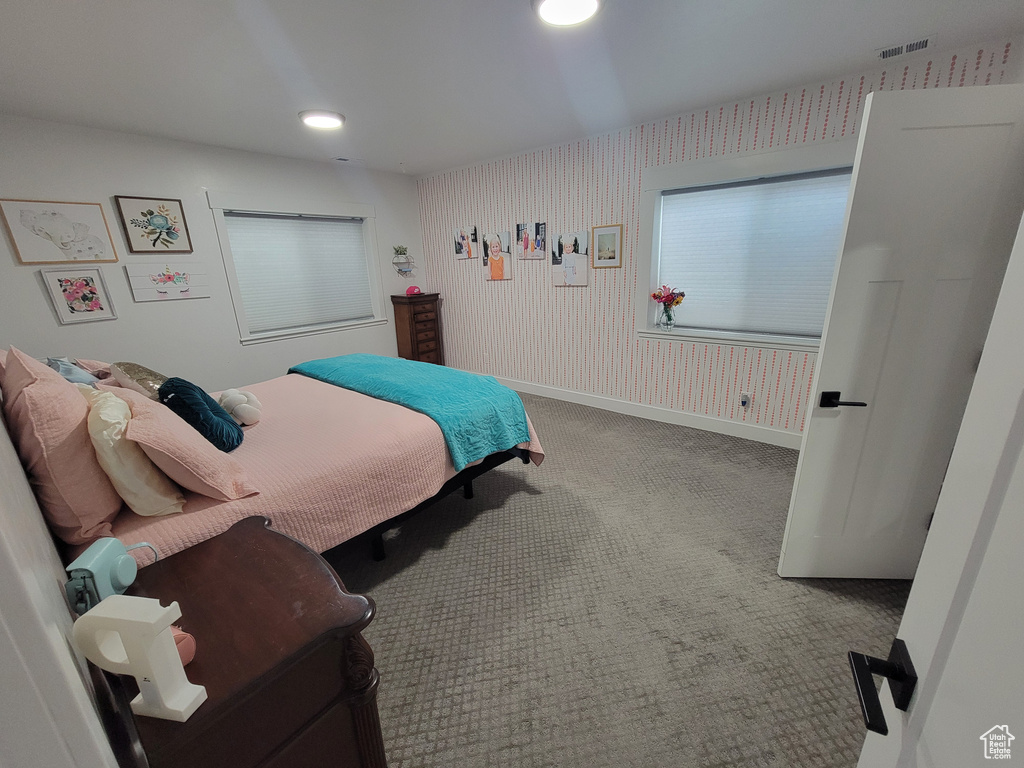 Carpeted bedroom featuring recessed lighting