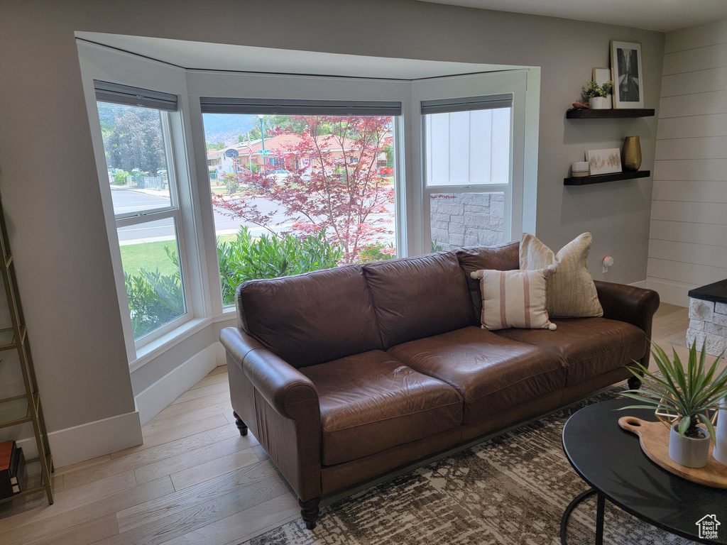 Living room with light wood-type flooring