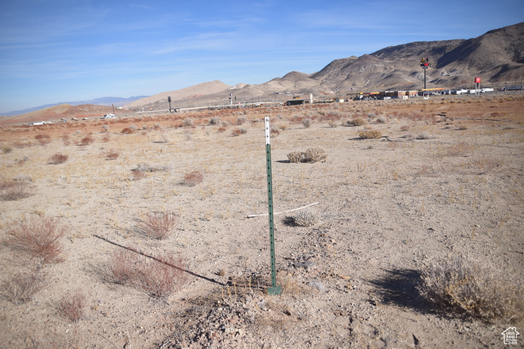View of mountain backdrop with a desert landscape