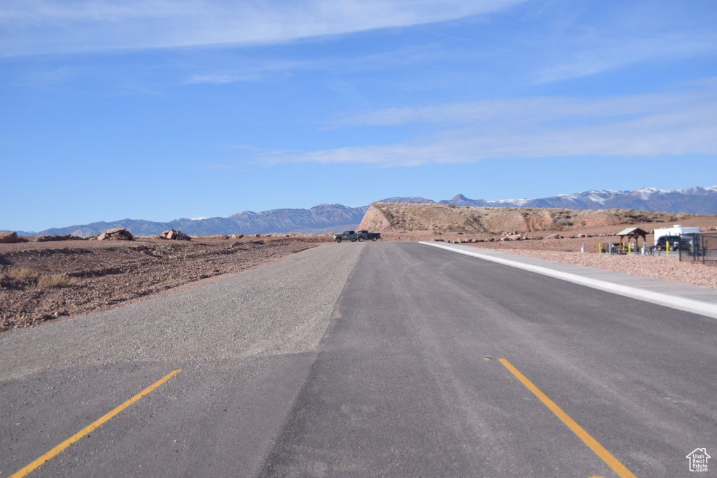 View of asphalt road featuring a mountain view