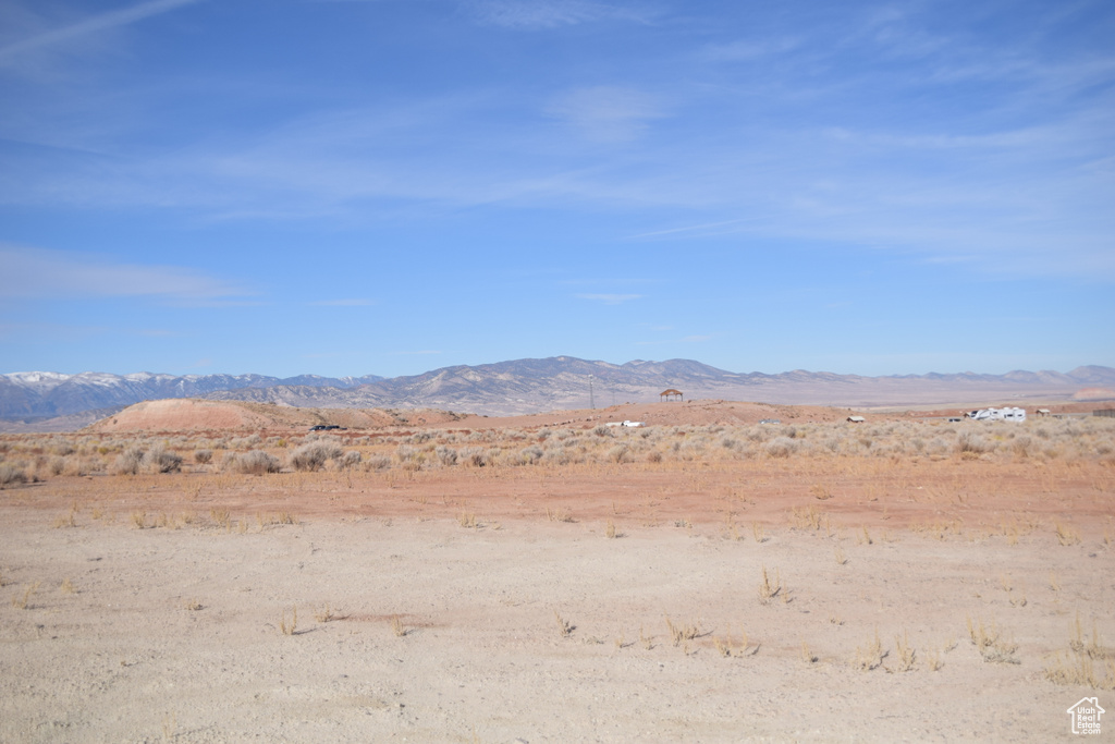View of mountain backdrop with a desert landscape