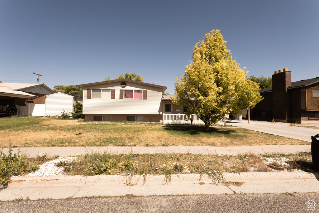 Tri-level home featuring driveway