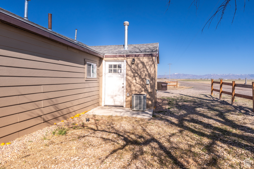 Doorway to property with a mountain view