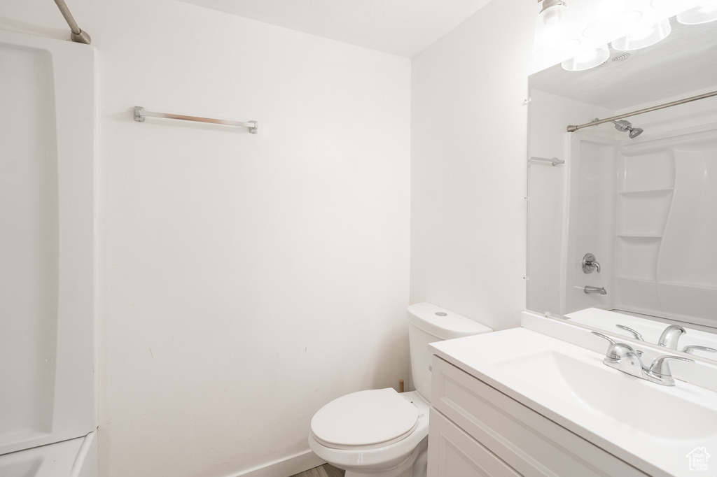 Bathroom featuring vanity and bathtub / shower combination