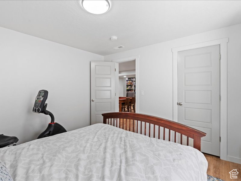 Bedroom with light wood-type flooring