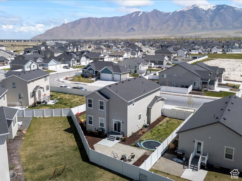 View of mountain background featuring nearby suburban area