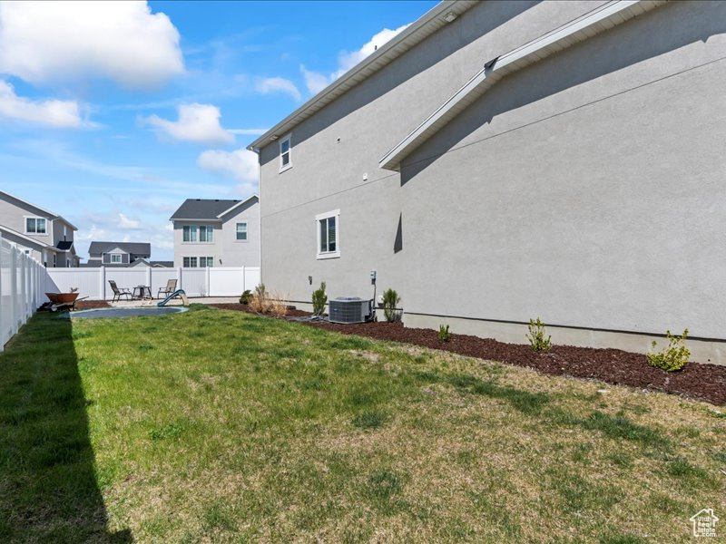 View of fenced backyard