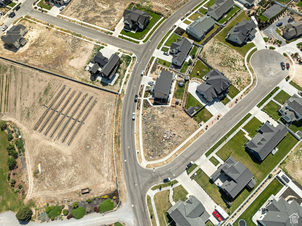 Aerial overview of property's location featuring nearby suburban area