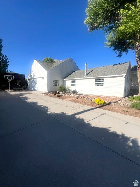 View of front of property featuring driveway