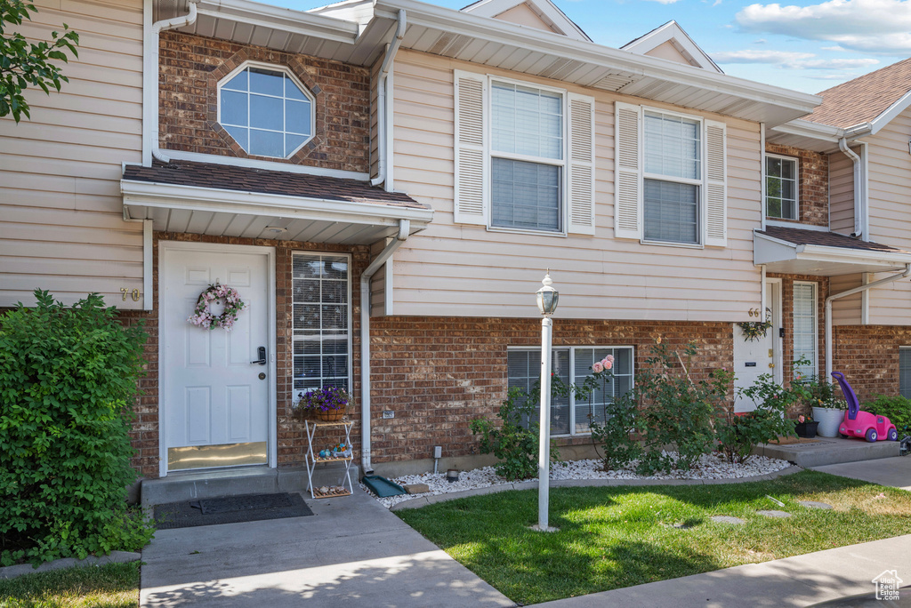 View of front of home with brick siding