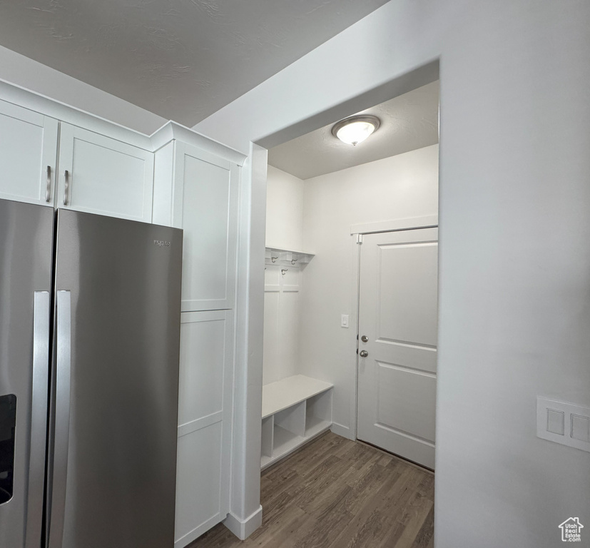 Mudroom with dark wood-style floors