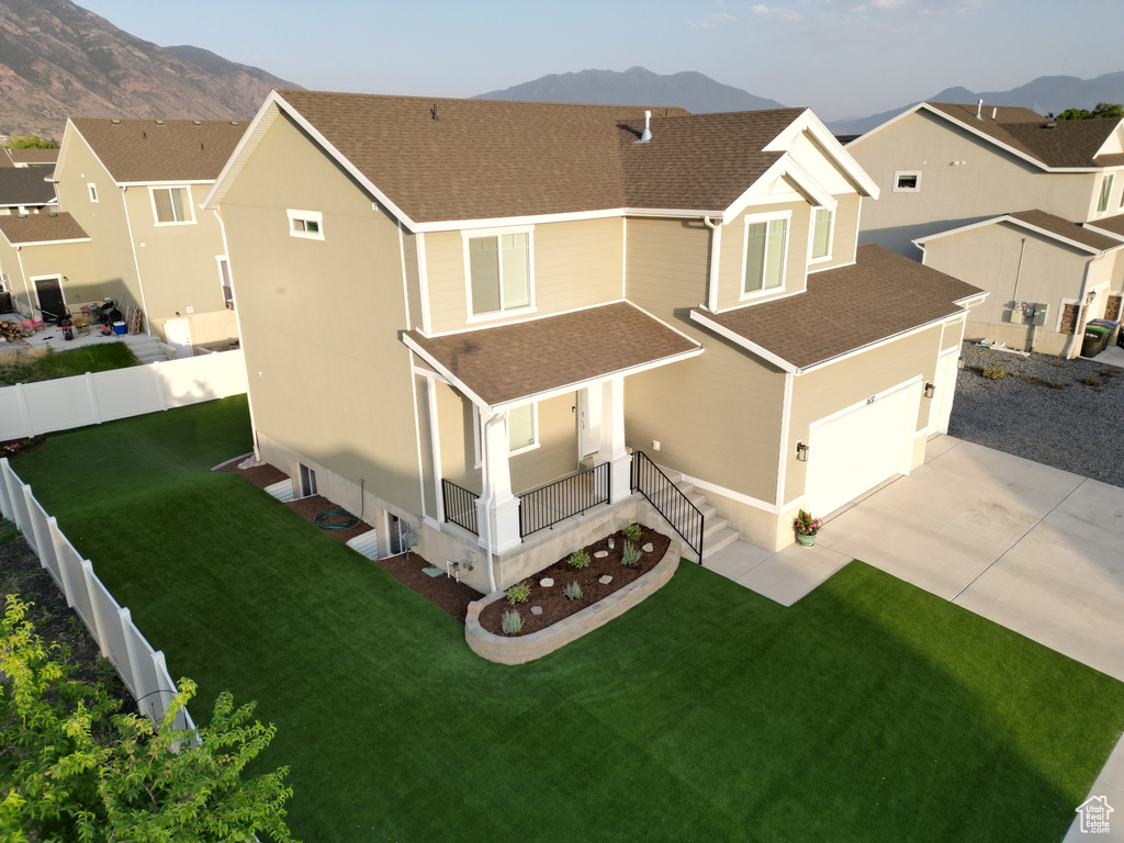 Aerial view of residential area with mountains