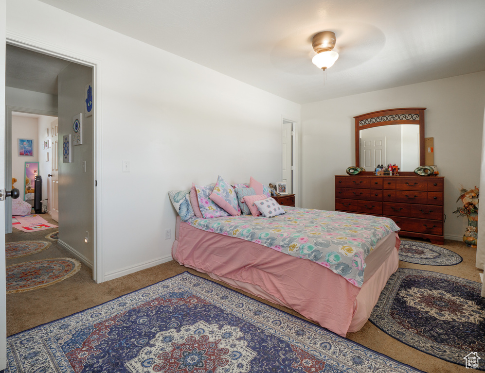 Bedroom with carpet flooring and ceiling fan