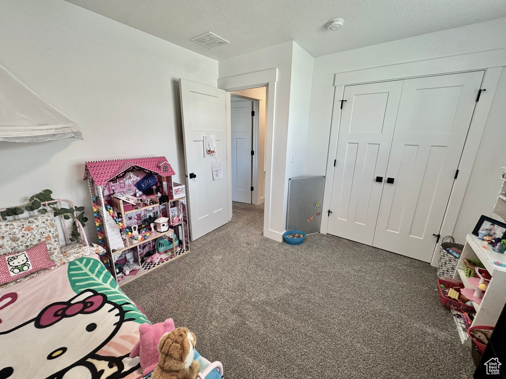 Playroom featuring carpet flooring