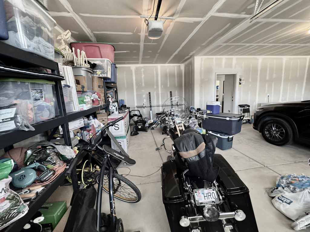 Garage featuring a garage door opener