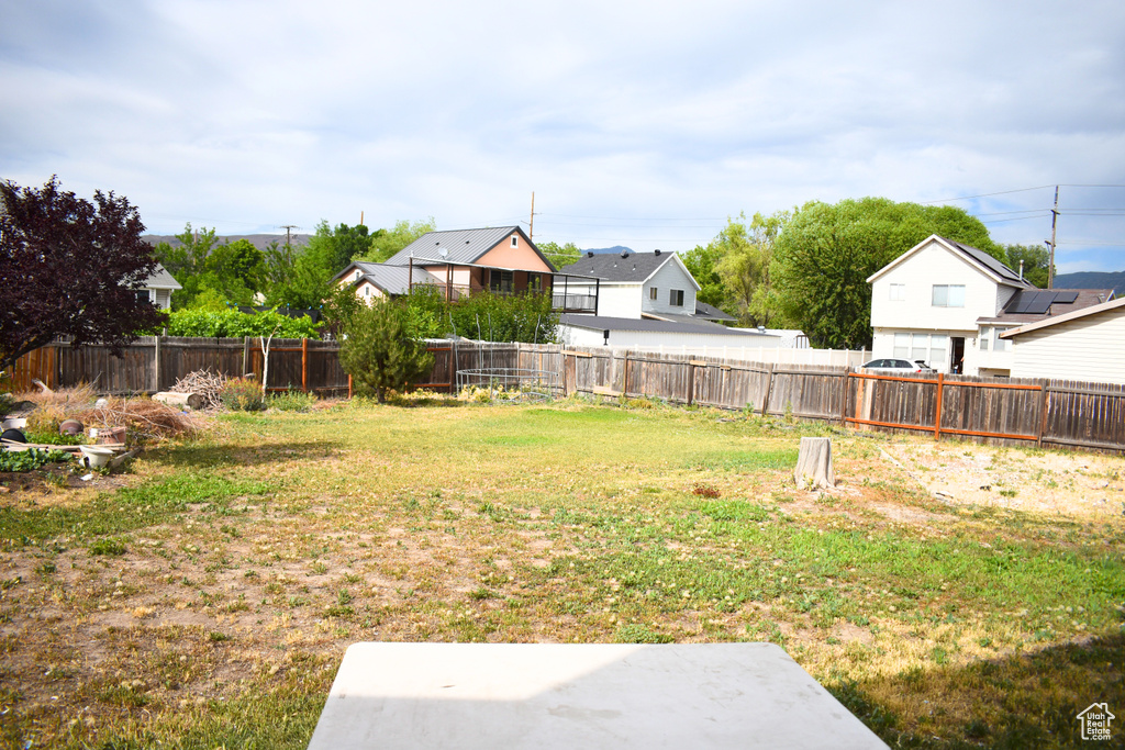 View of fenced backyard
