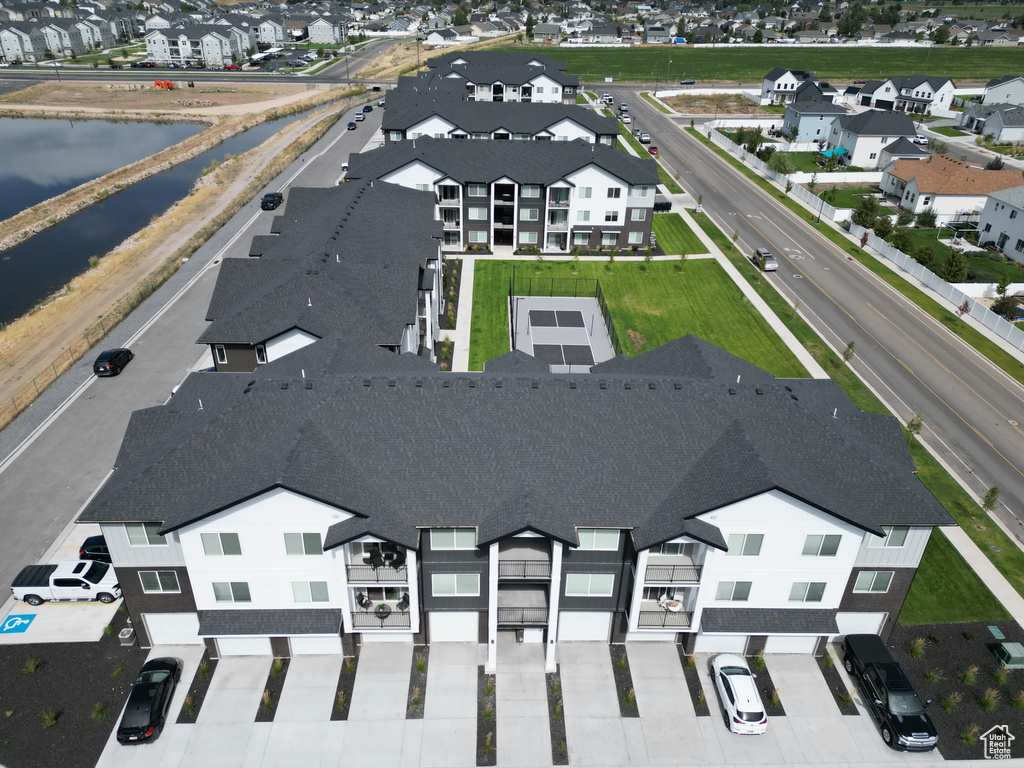 Aerial view of residential area with a nearby body of water