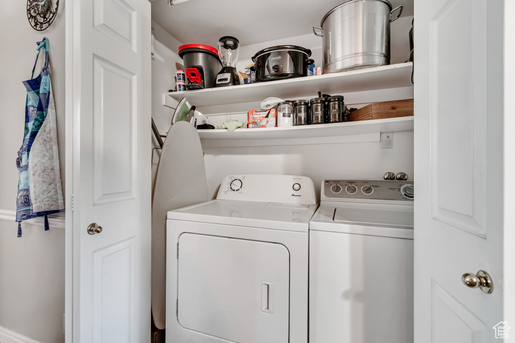 Laundry area featuring separate washer and dryer
