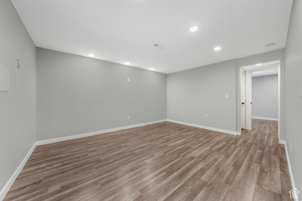 Unfurnished room featuring light wood finished floors and recessed lighting