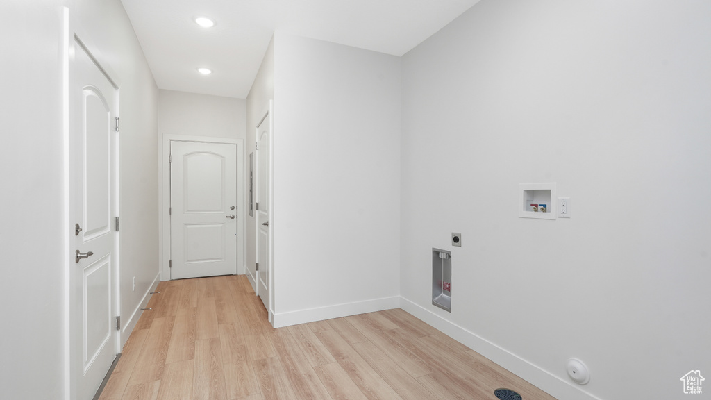 Laundry room featuring washer hookup, light wood finished floors, electric dryer hookup, hookup for a gas dryer, and recessed lighting