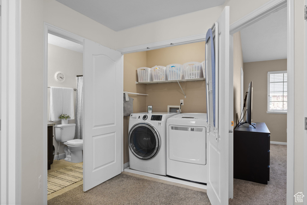 Washroom with independent washer and dryer and carpet floors