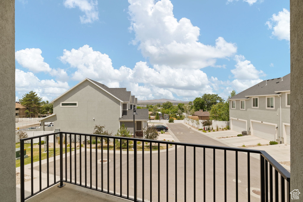 Balcony featuring a residential view